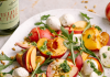 Stone fruit caprese salad with bocconcini and basil pesto drizzle